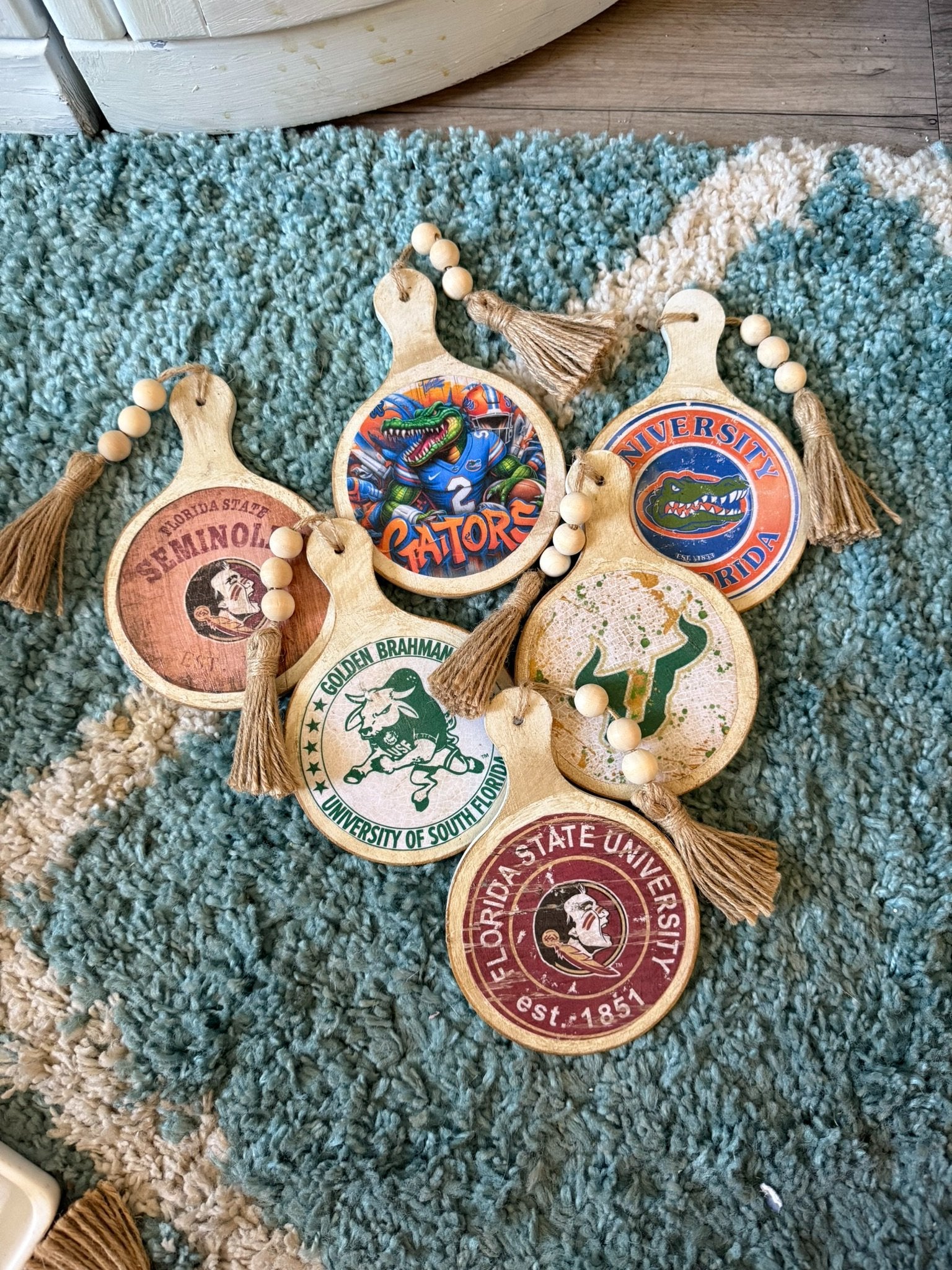 66d34fc959a1090905669a5e_wooden-round-decor-with-tassle_1766430710840.jpeg