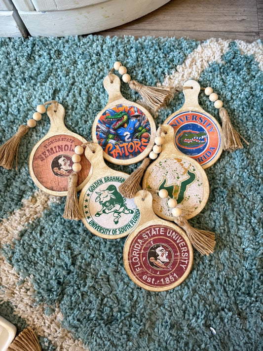 66d34fc959a1090905669a5e_wooden-round-decor-with-tassle_1766430710840.jpeg